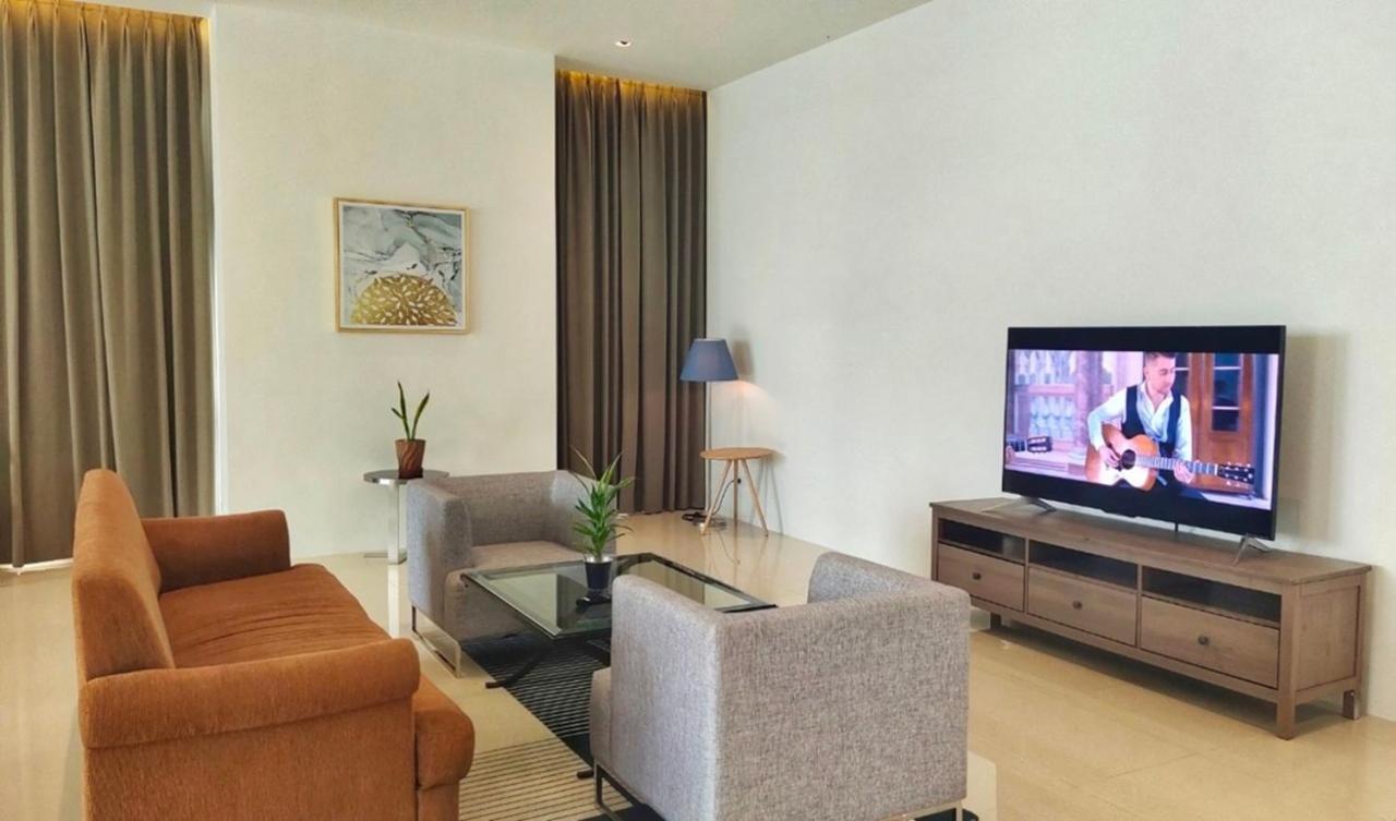 Jasmine 59 Hotel Bangkok Eksteriør billede A living room in a serviced apartment in Ho Chi Minh City, Vietnam